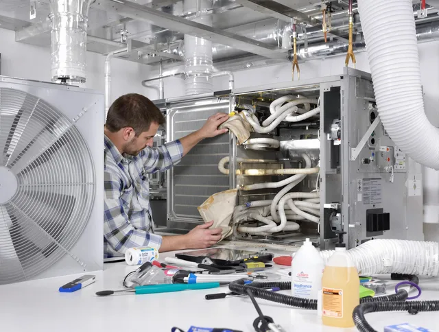 Bellingham Air Duct Cleaning specialist performing precision AC coil cleaning in Bellingham