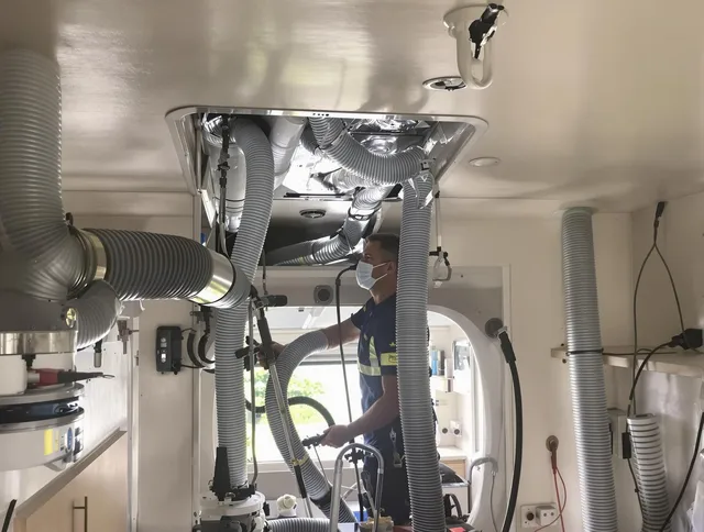 Bellingham Air Duct Cleaning specialist performing precise mobile home duct cleaning in Bellingham