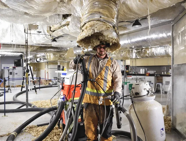 Professional vacuum insulation removal by Bellingham Air Duct Cleaning expert in Bellingham